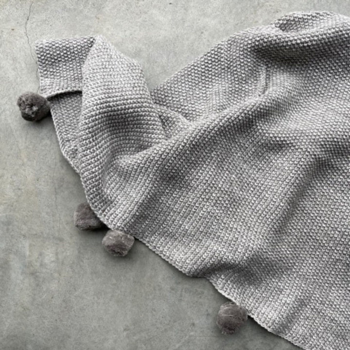 Soft Gray Knit Pompom Blanket